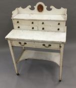 A Victorian white painted pine bonheur de jour