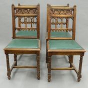 A set of four Victorian Gothic Revival dining chairs