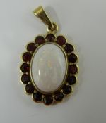 A 9 ct gold opal garnet pendant (3.