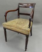 A 19th century mahogany bar back open armchair