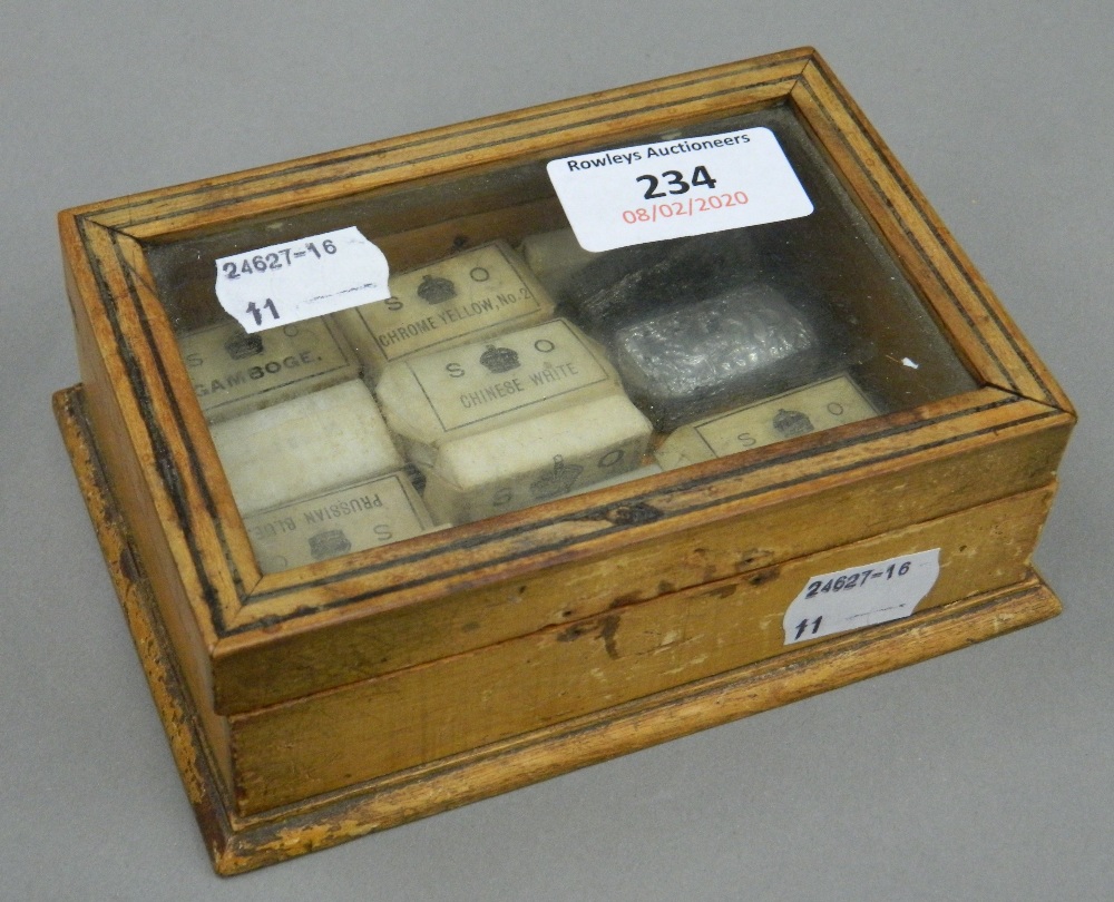 A box containing various Royal Stationery Office watercolour blocks