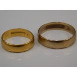 A 22 ct gold wedding band (3.7 grammes) and a 9 ct gold wedding band (2.