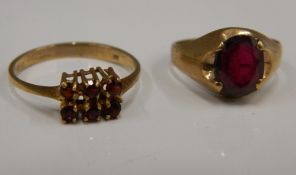 A 9 ct gold garnet ring and a 9 ct gold amethyst ring (4.