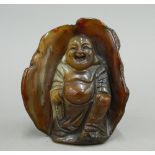 A Chinese carved agate model of Buddha