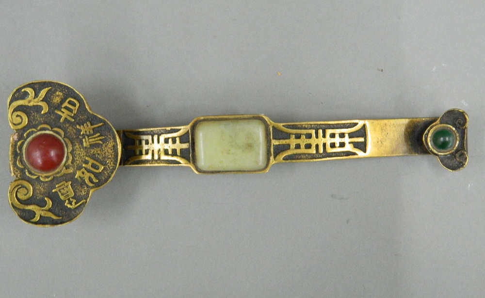 A bronze and jade ruyi sceptre
