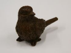 A bronze model of a bird