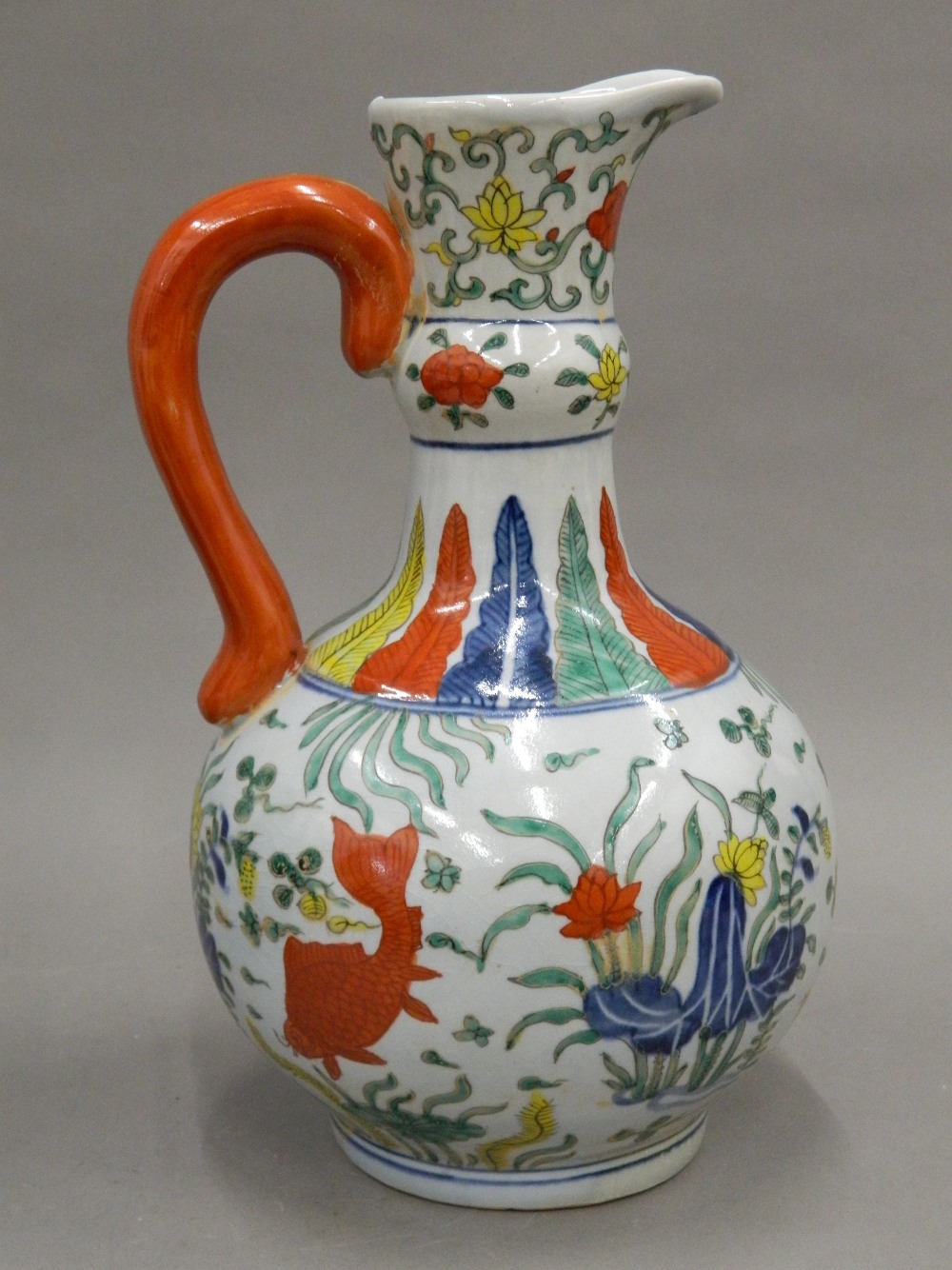 A Chinese coloured porcelain jug