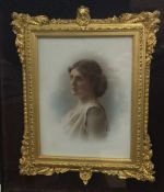 A late 19th century Female Portrait on milk glass,