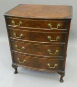 A small early 20th century bow front chest of drawers