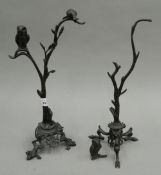 Two bronze model trees with birds