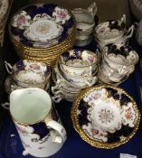 A gilt heightened florally decorated Coalport tea set