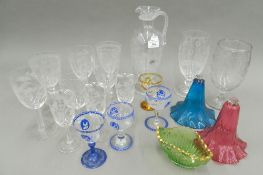 A quantity of etched and coloured glassware