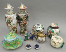 A quantity of Oriental pottery and porcelain. Vases 33 cm high.