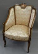 A Victorian mahogany upholstered armchair