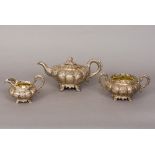 A William IV silver three piece tea set, hallmarked London 1834, maker's mark of Edward, Edward Jnr,