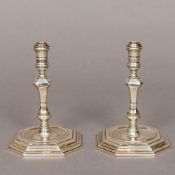 A pair of 18th century style silver taper sticks, hallmarked London 1996,