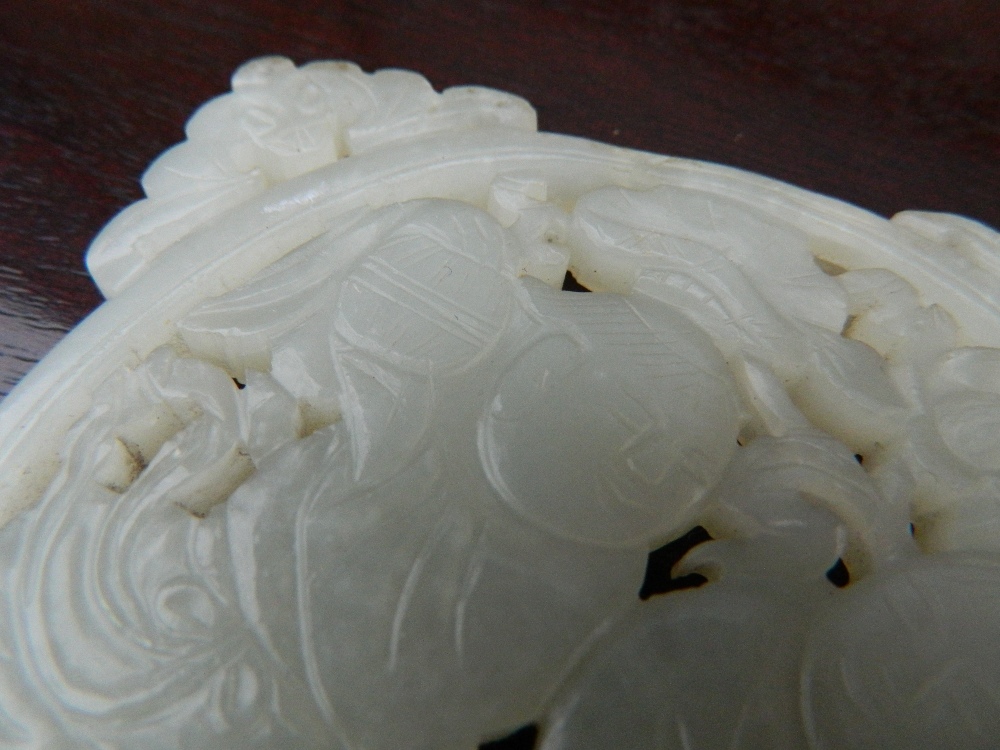 A Chinese pierced and carved jade roundel Centrally decorated with two young boys, - Image 13 of 13