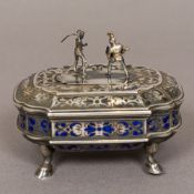 A 19th century Continental enamel decorated silver box Of hinged domed serpentine form,