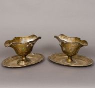 Two Continental, probably French, silver sauceboats Each of double lipped form with twin handles,