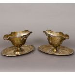 Two Continental, probably French, silver sauceboats Each of double lipped form with twin handles,