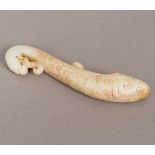 A Chinese carved pale jade belt hook Formed as a dragon. 15.5 cm high.