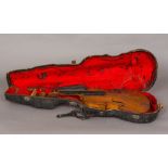 A 19th century violin With single piece back, cased. 56.5 cm long.
