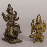 A bronze figure of Krishna Modelled seated astride a mythical beast;