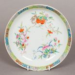 A 19th century Chinese porcelain dish With Greek key pattern border,