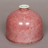 A Chinese porcelain peach bloom water pot Of typical domed form,