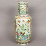 A large 19th century Canton famille verte porcelain vase Decorated in the round with birds and