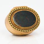 A 19th century bloodstone mounted unmarked gold vinaigrette Of hinged oval form with pierced