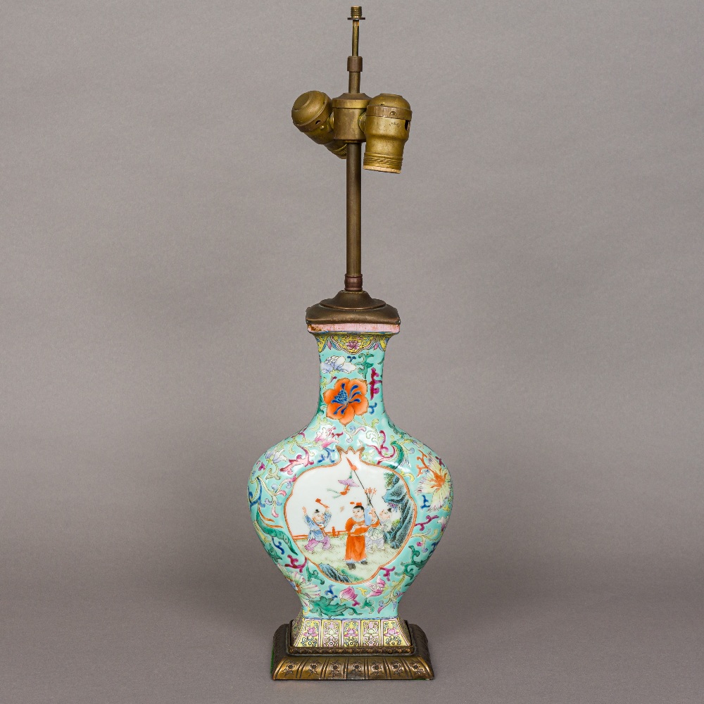 A Chinese porcelain vase Of flattened bulbous form, decorated with opposing figural vignettes,