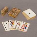 A set of fifty-two Georgian playing cards Of typical form, each decorated with hidden erotic scene,