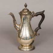 A George II silver coffee pot, possibly hallmarked for London 1775,