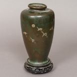 A Japanese Meiji period silver inlaid patinated bronze vase Of slender tapering ovoid form,