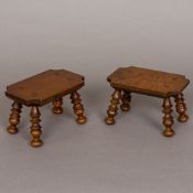 A pair of treen miniature stools/candle stands Each with chamfered rectangular top above four