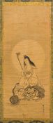 A Chinese framed scroll painting Decorated with Guanyin holding a ruyi sceptre seated on a dragon,