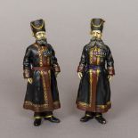 A pair of bronze figures Each formed as a bearded Russian soldier. Each 18 cm high.