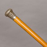 A Victorian Indian unmarked silver mounted Malacca walking stick The knop handle decorated in the