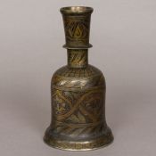A 19th century Eastern bronze hookah base Of typical form, with engraved foliate decoration.