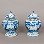 A matched pair of 19th century Chinese blue and white decorated jars Each of squat baluster form,