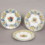 Three 19th century East India Company porcelain plates Each centred with an armorial crest,