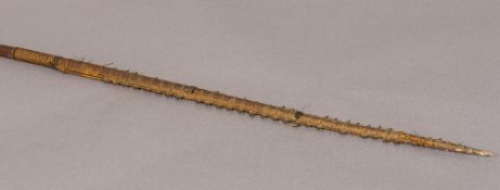 A Micronesian shark tooth sword, possibly from the Gilbert Islands,