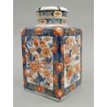 A 19th century Japanese Imari tea canister Of large square section form, mounted with removable lid.