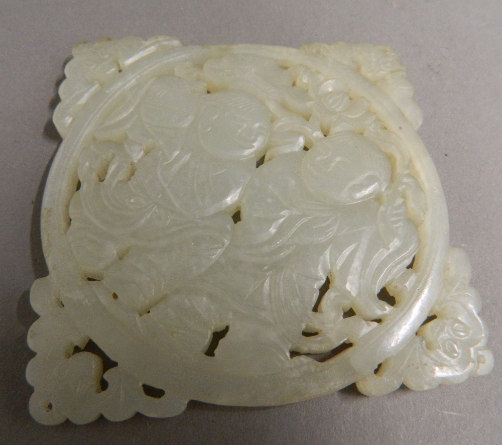 A Chinese pierced and carved jade roundel Centrally decorated with two young boys, - Image 3 of 13