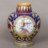 An Italian maiolica albarello, possibly Urbino/Deruta Of squat bulbous form,