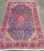 A red and blue ground Hamadan carpet 215 x 130 cm.