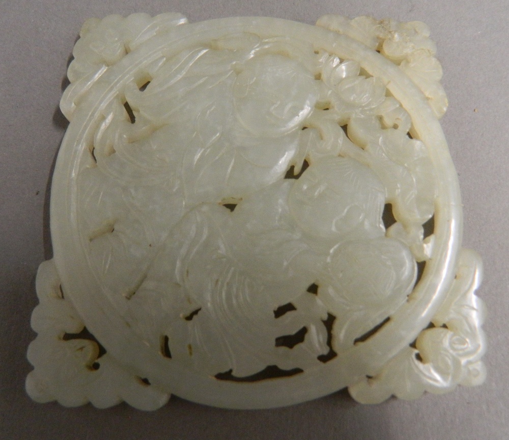 A Chinese pierced and carved jade roundel Centrally decorated with two young boys, - Image 2 of 13