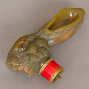 A carved agate walking stick handle Formed as a hare with gem set cabochon eyes and guilloche