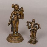 A coppery-bronze figure of Shiva Modelled standing; together with a bronze figure of Ganesh. 14.